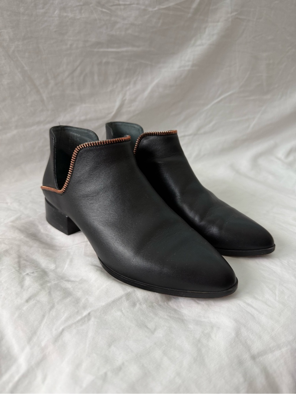 Black Leather Women's Ankle Booties with Copper Zipper-effect Trim